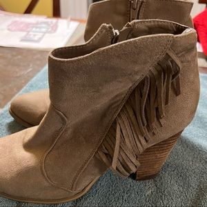Women’s Size 10 Booties with heel
Fringe and zipper on sides.